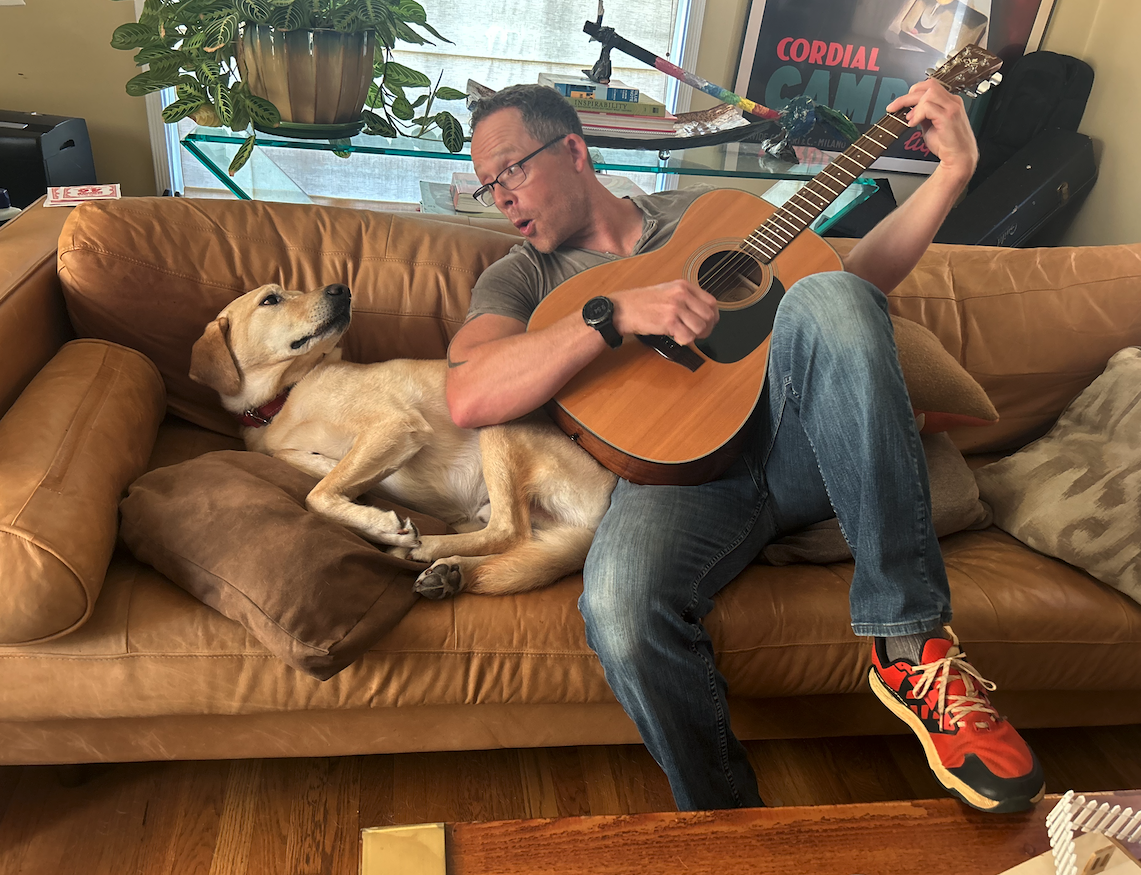 Guitar student Jayson with his dog Sonny at the Atwater Village studio