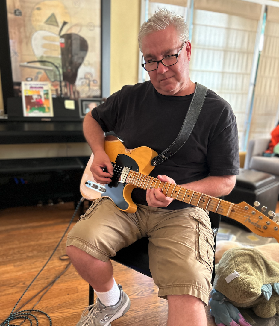 Adult guitar student Mike working on rhythm technique with Matt Rosenfeld